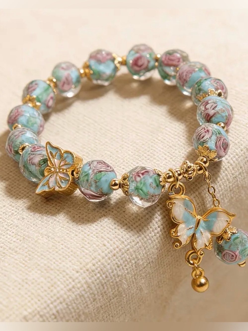 Gold Butterfly Charm Blue Floral Bracelet. - Picture 6 of 8